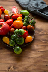 Fresh tomatoes on plate, healthy food