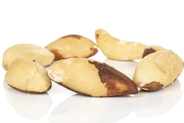 Group of seven whole brazil brown nut isolated on white background
