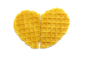 Waffle crisp butter flavor biscuits isolated on white background. Heart concept.