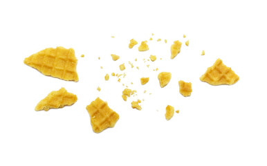 Crumbs of waffle crisp butter flavor biscuits isolated on white background.