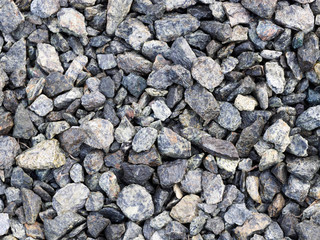 Background from gray small stones. Caucasus