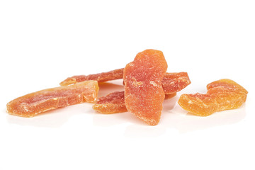 Group of five whole dried orange papaya piece isolated on white background