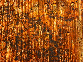 wall with traces of paint and rust