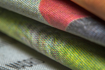 Macro shots folded a newspaper closeup picture