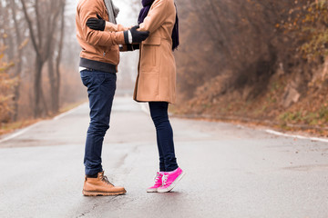 Couple enjoying outdoors in cold autumn / winter time.