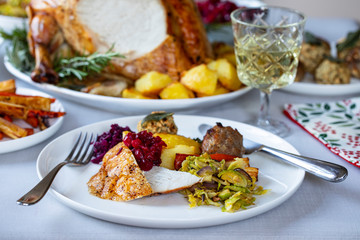 Christmas dinner with roast turkey crown and vegetables