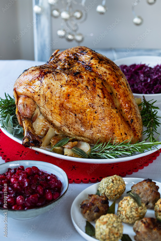 Wall mural christmas dinner with roast turkey crown and vegetables