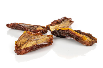 Group of four whole arranged dried red tomato piece isolated on white background