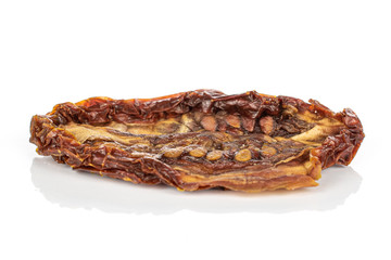 One whole dried red tomato piece isolated on white background
