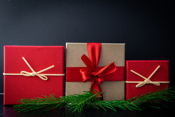 Gift red boxes on dark background