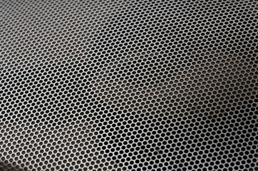  illustration of chrome metal grid with rounded honeycombs