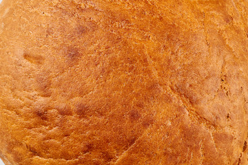 Freshly baked bread background. Close up of bread crust. Healthy homemade product.