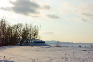 Winter snowy landscape with hills and trees