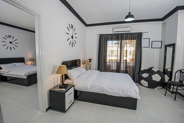 Interior design of double bedroom in apartment