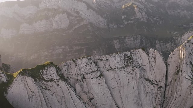 Aerial shot in 4k. Flying over a dramatic rock formation. Cinematic scene. 