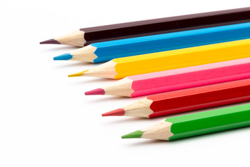 Colorful color wooden pencils on a white background