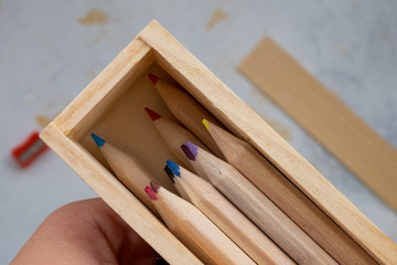 wooden pencil case with colour pencils for back to school