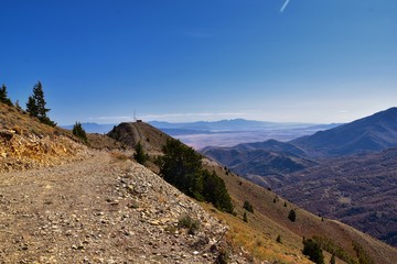 Wasatch Front Rocky Mountain landscapes from Oquirrh range looking at Utah Lake during fall. Panorama views near Provo, Timpanogos, Lone and Twin Peaks. Salt Lake City. United States.