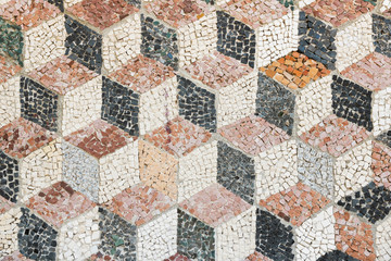 Geometric mosaic made from stone. Antique pattern.