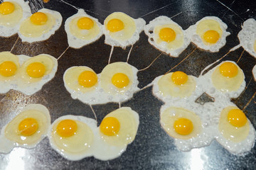 eggs in the kitchen of the restaurant scrambled egg yolk protein