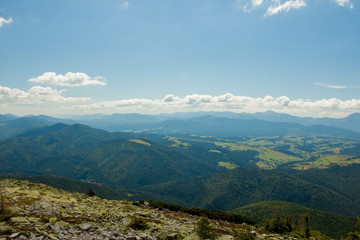 Beautiful mountain landscape, with mountain peaks covered with forest and a cloudy sky. Ukraine mountains, Europe