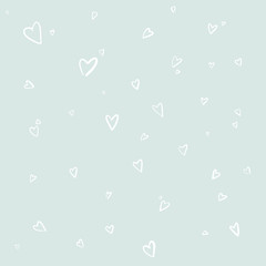 Light green romantic background with white hearts drawn by hand in doodle style. Copy space.