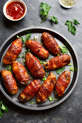 Bacon wrapped grilled chicken wings