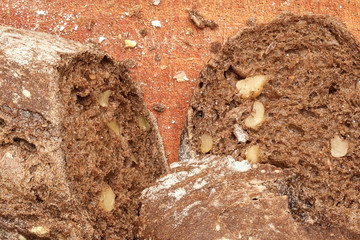 Delicious handmade wholemeal bread with nuts on a rustic wooden table
