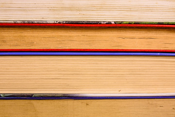 Stack of the different old books for background