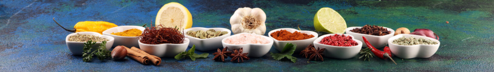 Spices and herbs on table. Food and cuisine ingredients with oil and vinegar