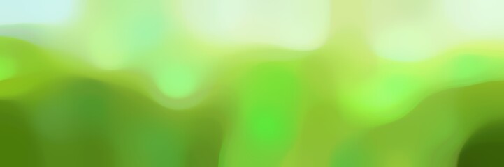 blurred bokeh horizontal background bokeh graphic with moderate green, tea green and khaki colors and free text space