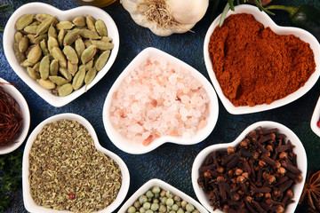 Spices and herbs on table. Food and cuisine ingredients with oil and vinegar