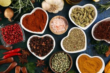 Spices and herbs on table. Food and cuisine ingredients and lemon