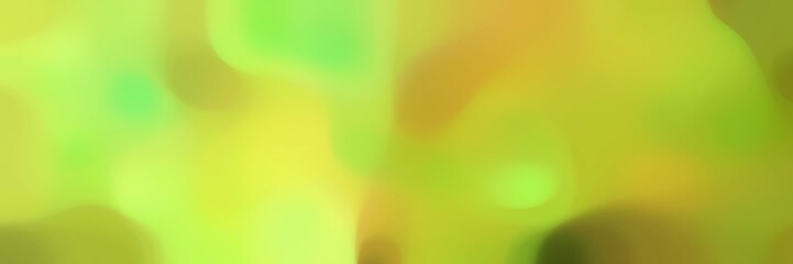 unfocused horizontal background texture with yellow green, olive drab and khaki colors and space for text or image