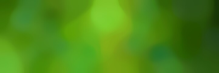 blurred bokeh horizontal background graphic with dark green, very dark green and moderate green colors space for text or image