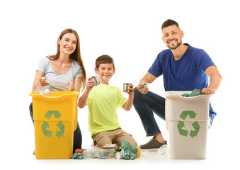 Family with containers for garbage on white background. Concept of recycling