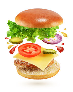 Flying burger isolated on white background