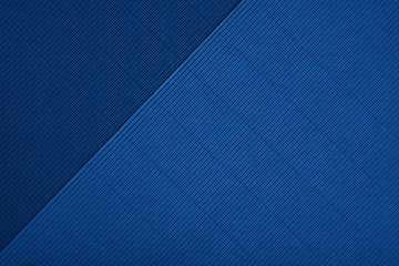 Abstract textured geometric paper in blue color background.