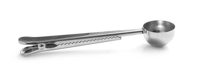 Clean spoon for ice-cream on white background