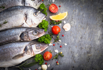 Fresh raw sea fish on the stone background