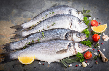 Fresh raw sea fish on the stone background