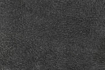 Fototapeta premium The texture of natural black suede. View from above.