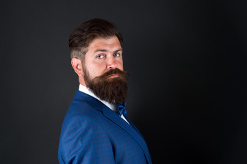 Obraz premium Masculine aesthetic. Few grooming life hacks help achieve great look, whatever occasion. Well groomed man beard in suit. Male fashion and aesthetic. Businessman formal outfit. Classic style aesthetic