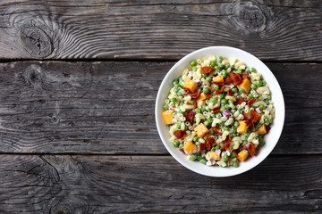 pasta salad with green peas, fried bacon