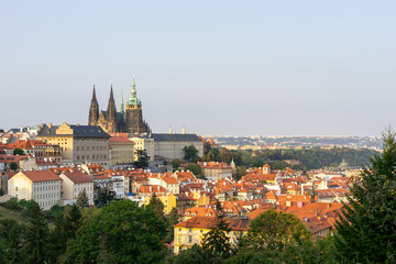 Fototapeta premium View at Prague castle at sunset with the city beneath