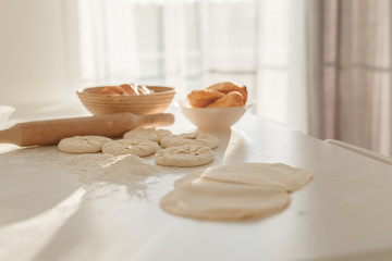 cooking traditional national dish, yeast dough, flour, women hands