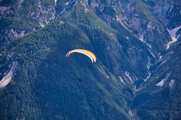 Paragliding in the mountains, in the Stubai Valley, Tyrol, Austria.