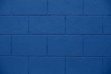 Brick background in blue.