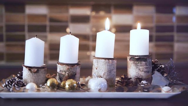 The candles on the Advent wreath are lit every Sunday according to tradition