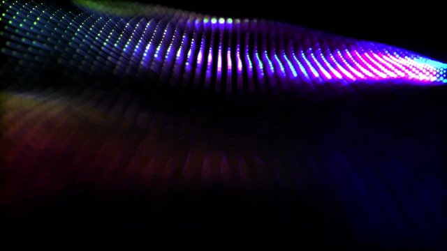 round particles with neon glow move slowly on a black background. Abstract animated background. 3d render